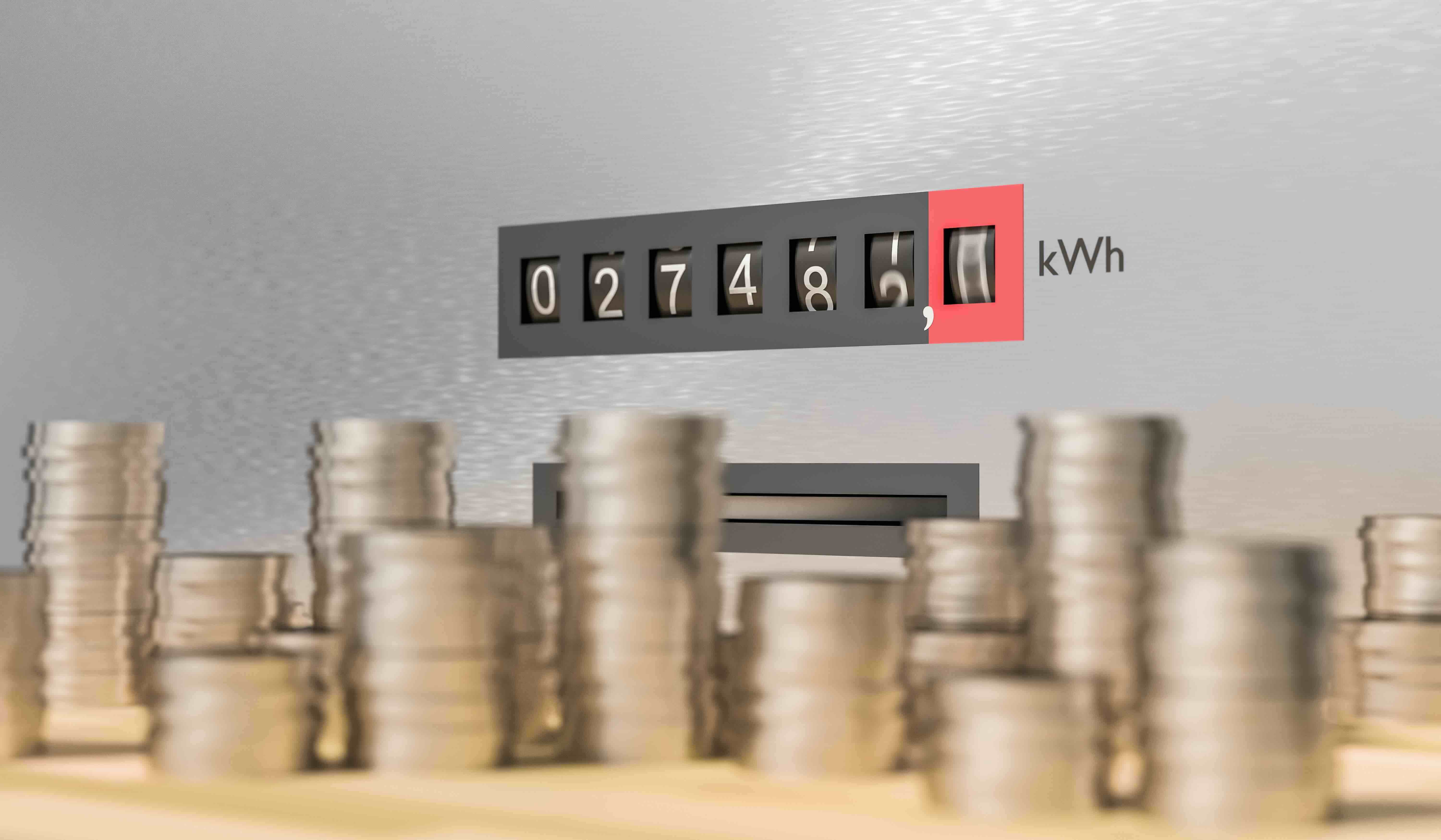 a fast-spinning 'odometer' style display, showing kilowatt hours, next to piles of coins